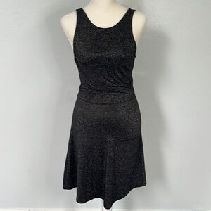 Divided little black dress.  Size 4. Lots of sparkle!